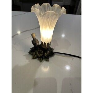 Dale Tiffany accent lamp featuring a white art glass shade and a brass base